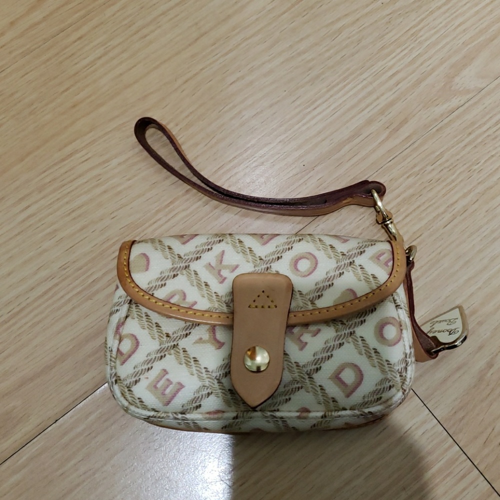 Dooney & Bourke cream colored clutch